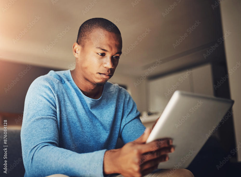 Aufkleber reading, tablet and man in home, serious and thinking of idea for creative thumbnail for social medi
