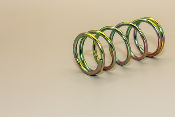 Fototapeta premium Coil and textured surface, close-up view