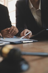 Lawyer, legal advisor, businessman brainstorming information on agreement details Business...