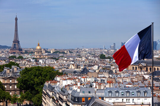 French flag with the cityscape of Paris