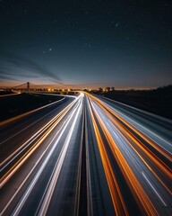 Nighttime on the highway, bright headlights streaking across bridges, city lights twinkling, long exposure capturing fluid movement, clear starry sky, wide-angle view