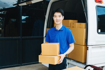 Asian courier delivery man searching the address on digital tablet.  near van outside the warehouse. This is a freight transportation