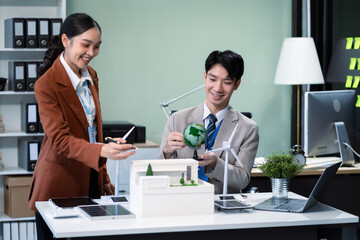 Engineer Teamwork Meeting, with partner on model building at company office working technology, Renewable energy-based green businesses and global warming.