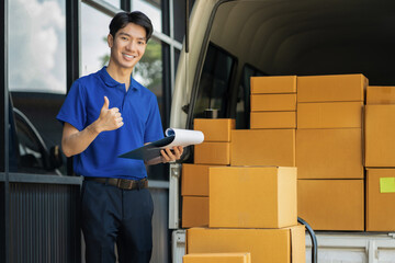 Asian delivery man, delivery men unloading cardboard boxes from truck.