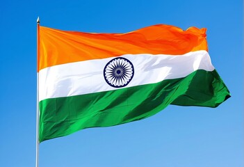 The majestic national flag of India flutters against the clear sky. Indian Independence Day.