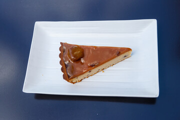 Piece of chestnut cheesecake on a table