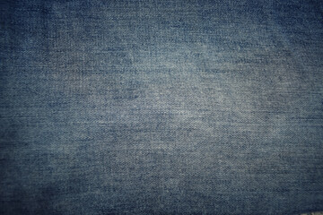 A faded light blue jeans texture background