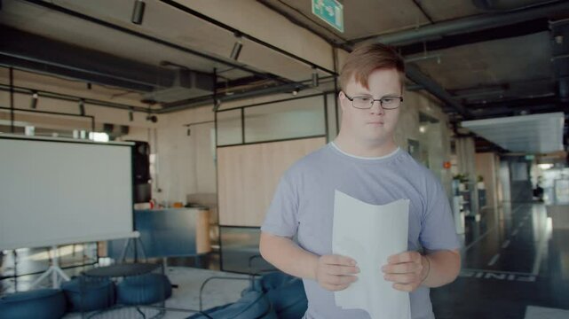 Man with intellectual disability gathering with colleagues