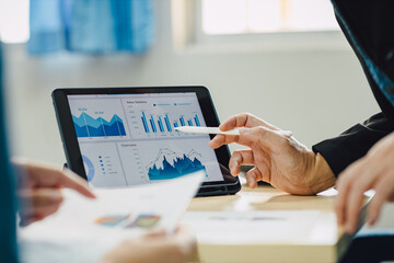 Two businessman consult analyzing company financial cash flow result. Concept for teamwork business meeting corporate and economy fund.