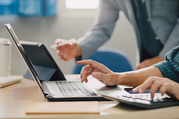 Two businessman consult analyzing company financial cash flow result. Concept for teamwork business meeting corporate and economy fund.