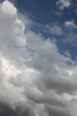 Blue sky. Beautiful Cumulus clouds flying across the sky,