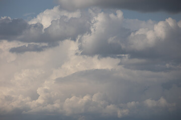 Blue sky. Beautiful Cumulus clouds flying across the sky,