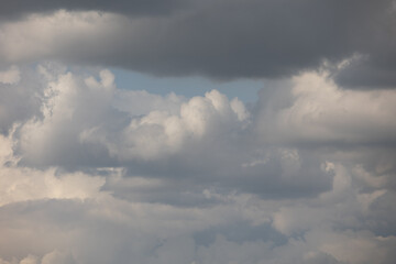 Blue sky. Beautiful Cumulus clouds flying across the sky,
