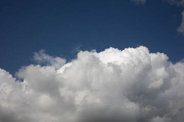 Blue sky. Beautiful Cumulus clouds flying across the sky,
