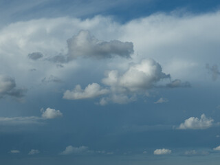 Blue sky. Beautiful Cumulus clouds flying across the sky,