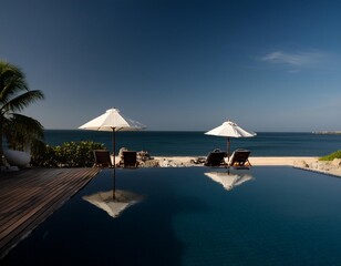 Fototapeta premium Umbrella and deck chair around outdoor swimming pool in hotel resort nearly sea beach ocean for travel vacation.