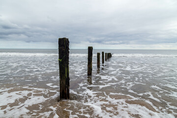 Weathered Posts Leading in to the Sea in Seaham County Durham