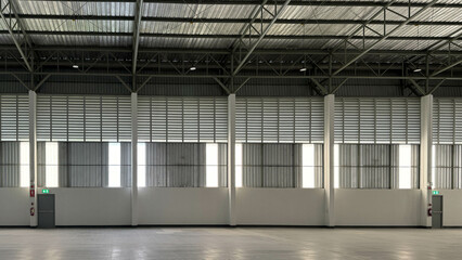 Modern warehouse interior with spacious, well-lit corridors and industrial design.