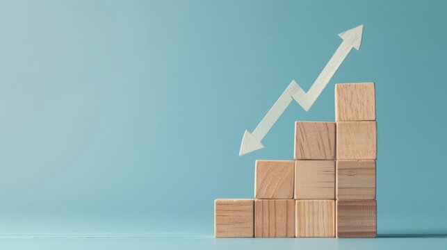 Wooden blocks with up and down arrows representing growth and decline.