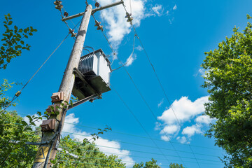Electrical transformer seen at the edge of a forest in East Anglia, supplying the small village...