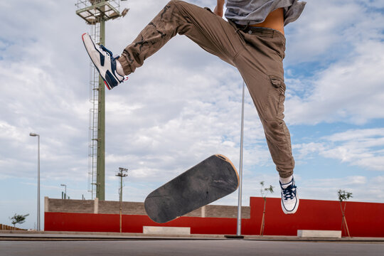 young man skating in a skate park