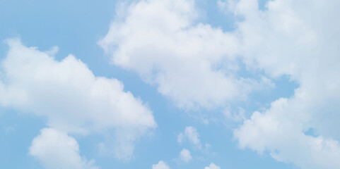Obraz premium blue sky background with white clouds. White cumulus clouds formation in blue sky. White clouds and blue sky. Panorama of blue sky with white clouds in sunny