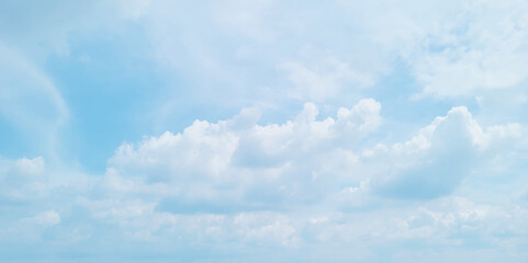 Obraz premium blue sky background with white clouds. White cumulus clouds formation in blue sky. White clouds and blue sky. Panorama of blue sky with white clouds in sunny