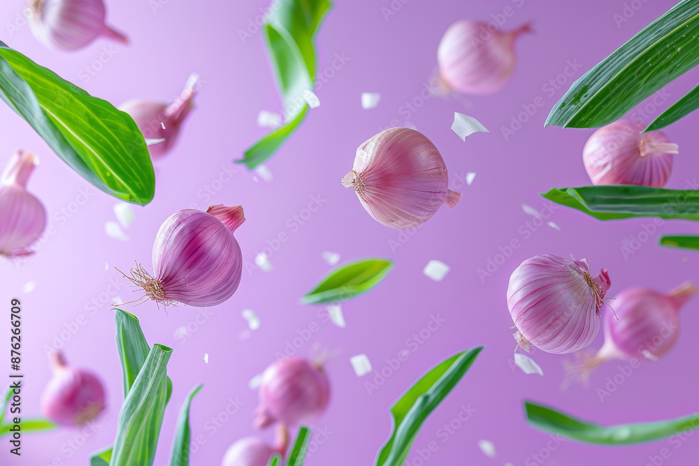 Wall mural vibrant floating red onions with green leaves on purple background