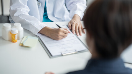 Medical Consultation Doctor Discussing Medication with Patient