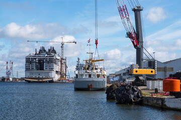 Fototapeta premium Ships in the port of Saint Nazaire in France, construction, repair and transport activities