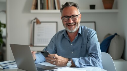 The smiling bearded man