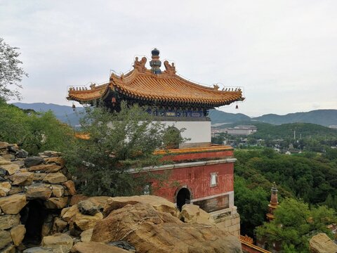 Chinese pagode house on a green forested hill in Beijing