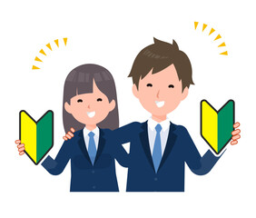 紺色のブレザーを着た学生男女。初心者マークを持って肩を組む。