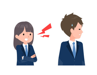 紺色のブレザーを着た学生男女。彼女は彼を激しく問い詰める。