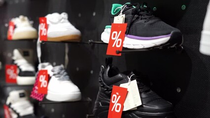 discounts on sneakers in the store percent discount label