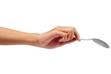 Female hand holding silver spoon isolated transparent