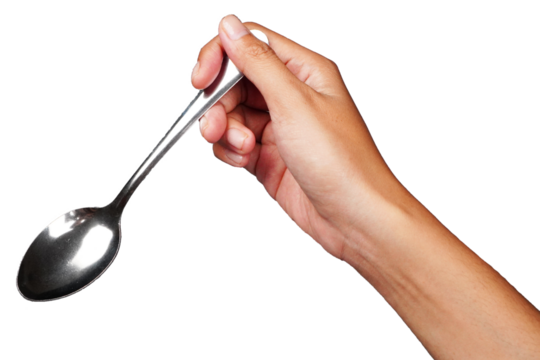 Female hand holding silver spoon isolated transparent