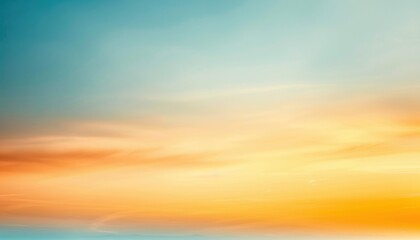 Obraz premium A gradient from a warm yellow to a cool blue, creating a minimalist and calming backdrop with a sense of sunrise or sunset