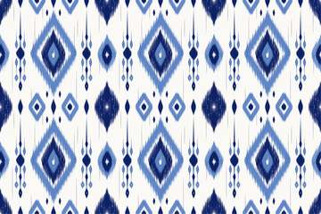 Blue ikat vector pattern in tribal style, ideal for textiles, boho packaging, and ethnic-inspired design projects.