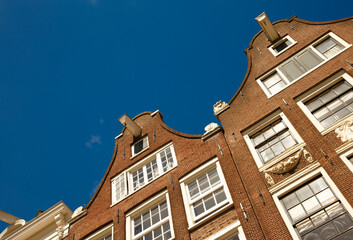 Panoramic view of Amsterdam canals and typical dutch houses