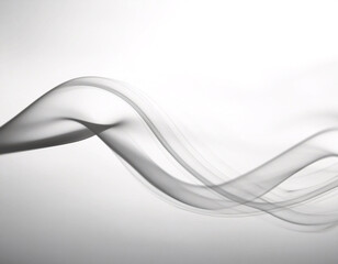A long, curvy line of smoke is shown in a gray background