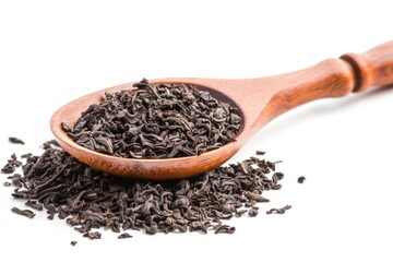 A traditional wooden spoon filled with black tea leaves, perfect for brewing tea