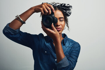 Camera, woman and photographer in studio for creative paparazzi career with media press. Art,...