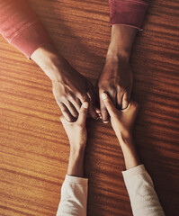 Couple, holding hands and above for support in home for care, connection and empathy for mental...