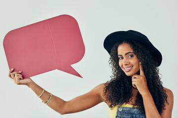 Happy girl, portrait and thinking with speech bubble for question, notification or social media on a white studio background. Young female person with smile, shape or wonder for news on mockup space