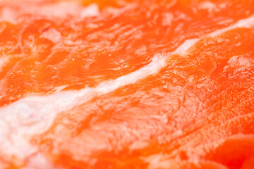 Salmon texture. Texture of fresh juicy salmon fillet close-up. Selective focus