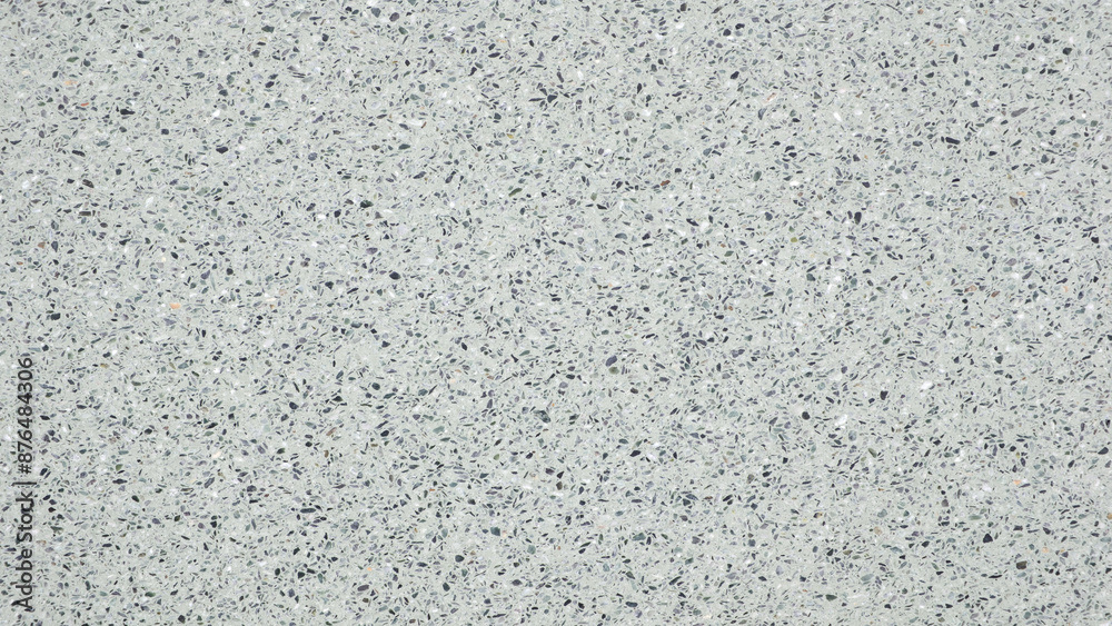 Poster A white wall with a pattern of small dots. The wall is plain and unadorned. The dots are evenly spaced and cover the entire surface of the wall. The wall appears to be made of a smooth