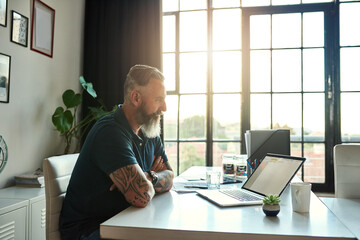 Mature boss, businessman and arms crossed on laptop in office for feedback email, company review or website update. UX designer, person and pride at desk to monitor online software or app development