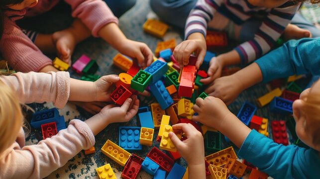 Creative Kids Having Fun with Building Blocks | Happy Children Playing and Constructing with Colorful Toys | Copy Space for Text