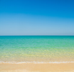 Fototapeta premium Horizon beautiful landscape summer season vertical front view tropical sea beach white sand clean blue sky cloud background calm nature ocean wave water travel holiday relax at island sun day time